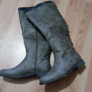 Grey knee high boots.